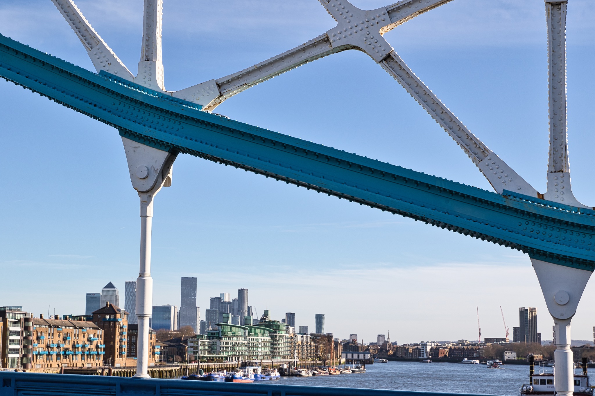 Teal and White Bridge Structure with London Skyline