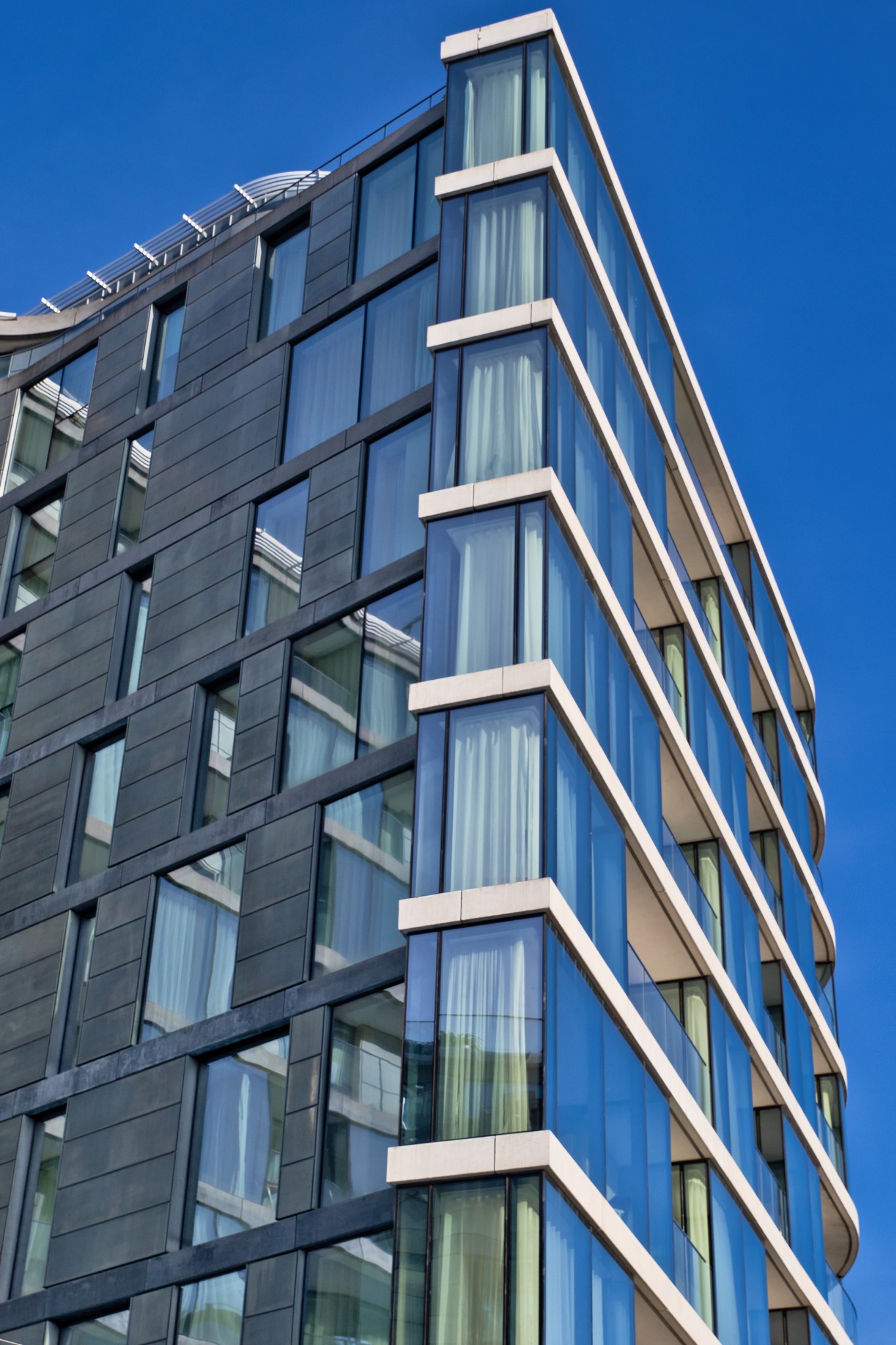 Modern Building Exterior: Corner View of Multi-Story Structure in London, UK.