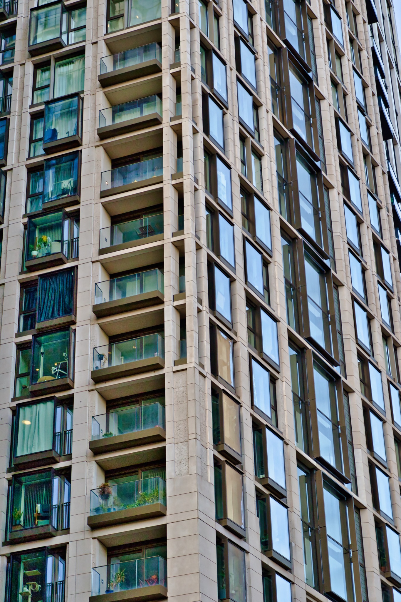 High-Rise Residential Building Facade with Balconies and Windows in London, UK.