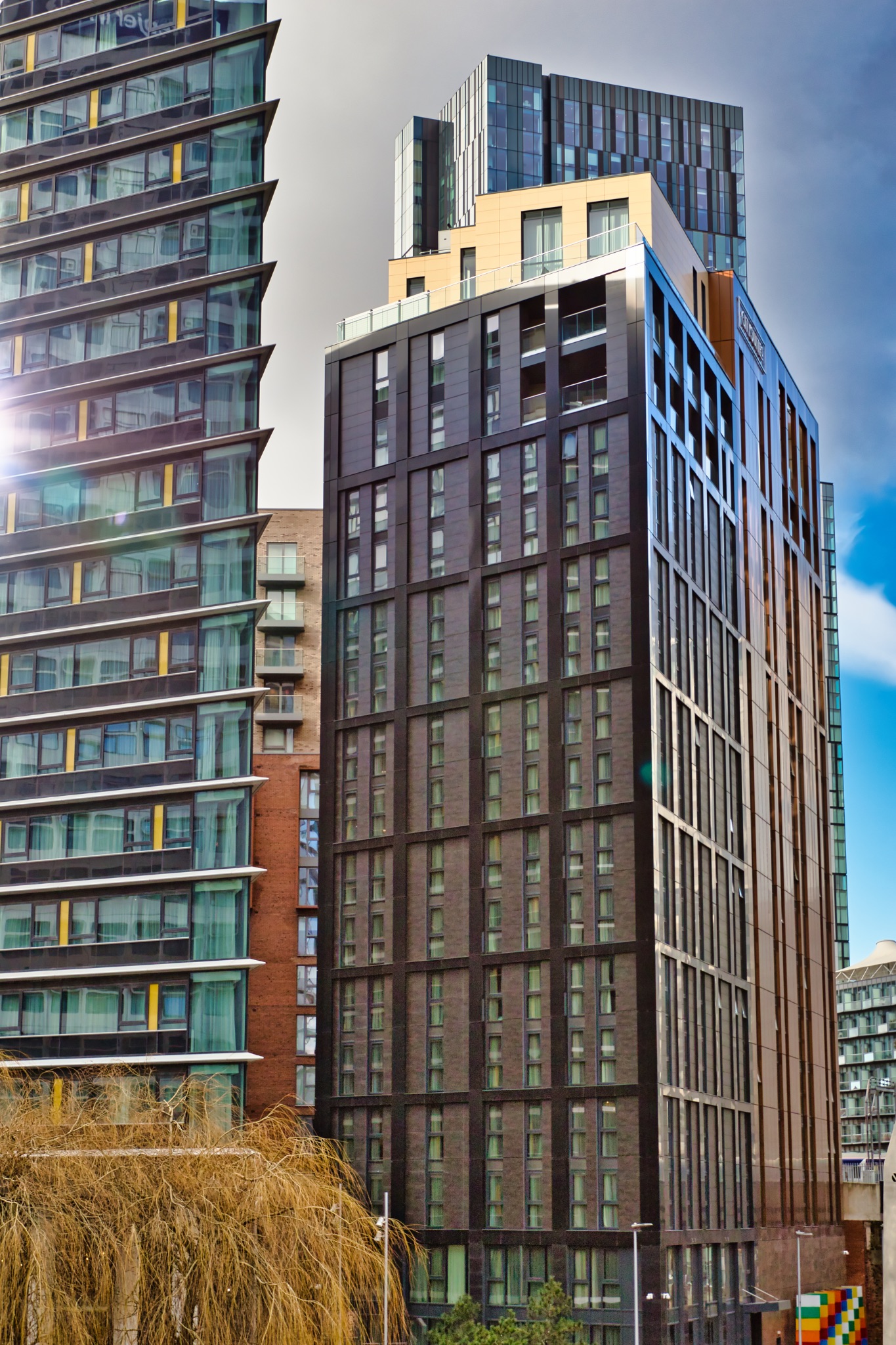 Modern High-Rise Apartment Buildings in Urban Setting in Manchester, UK.