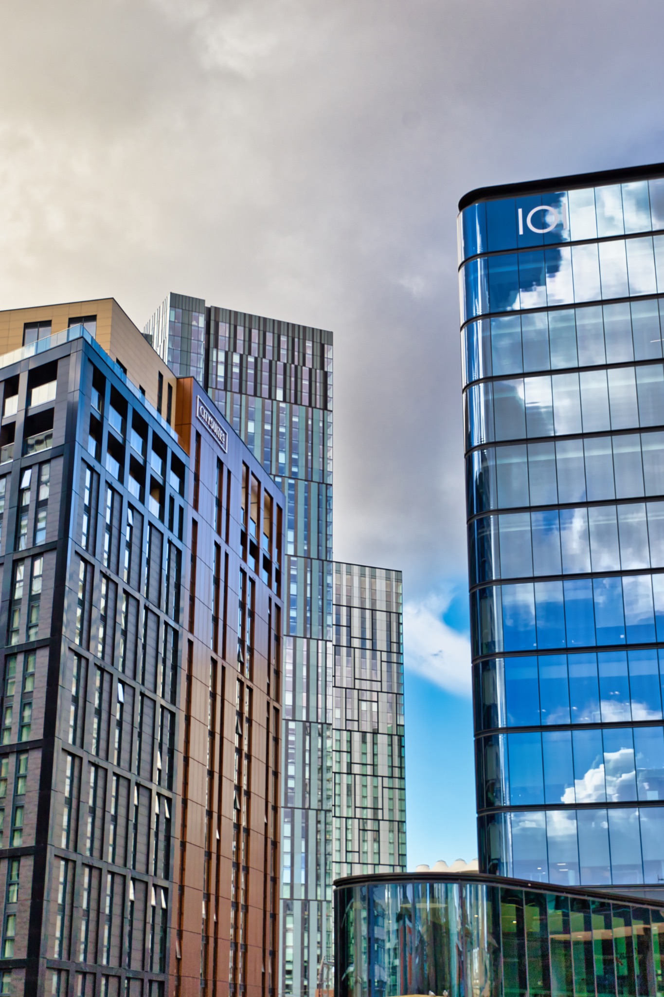 Modern City Buildings with Varied Architectural Styles in Manchester, UK.