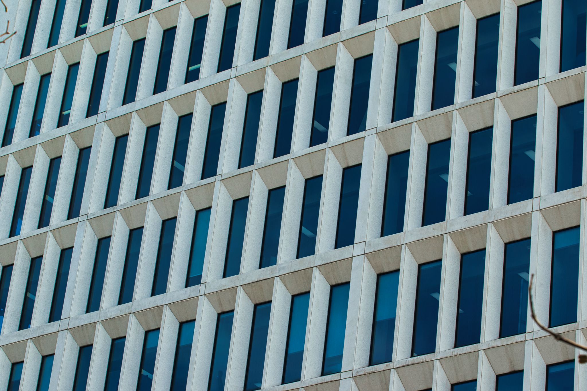 Building Facade with Rectangular Windows in Manchester, UK.