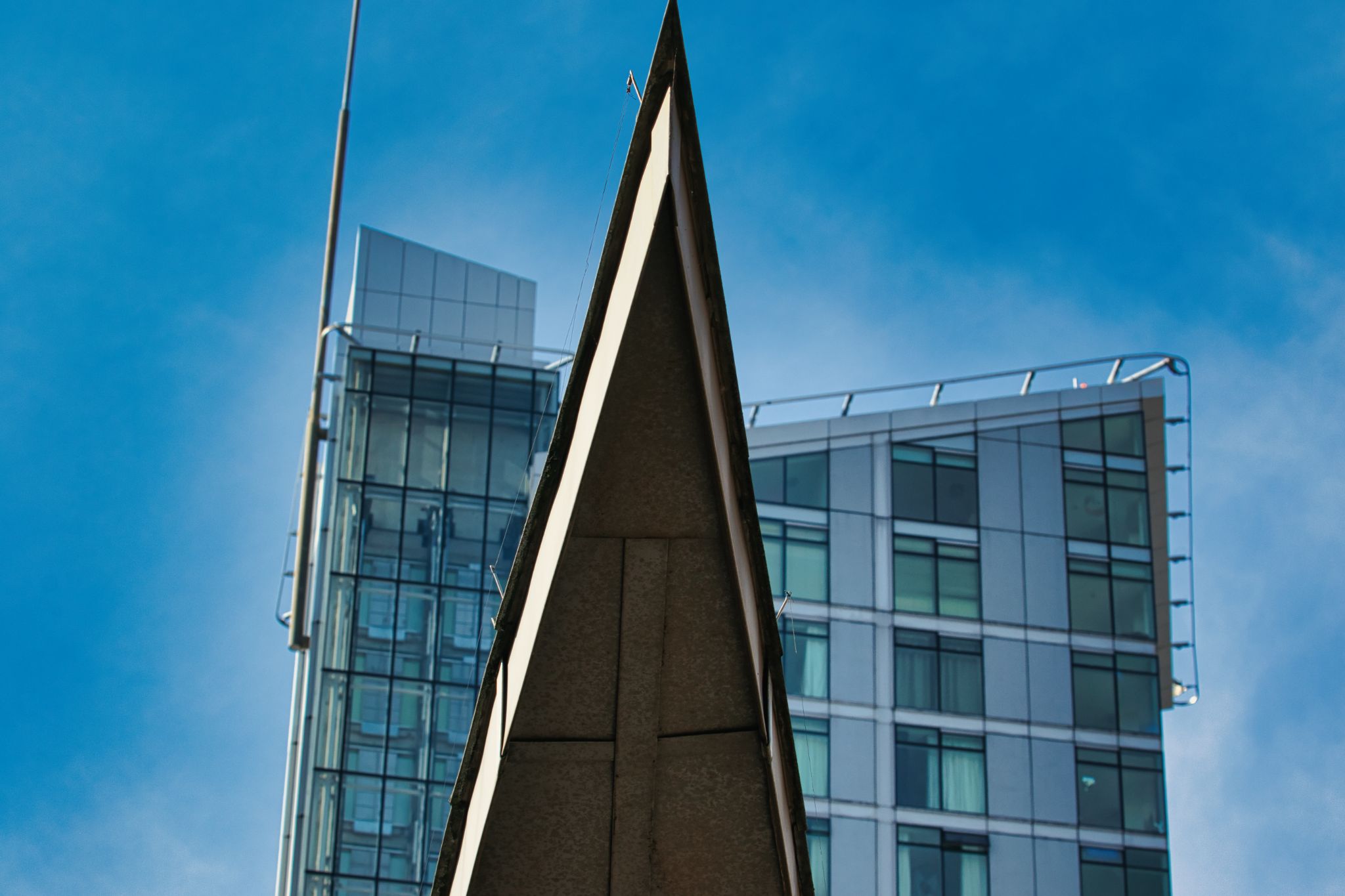 Peaked Structure with Modern Buildings in Manchester, UK.