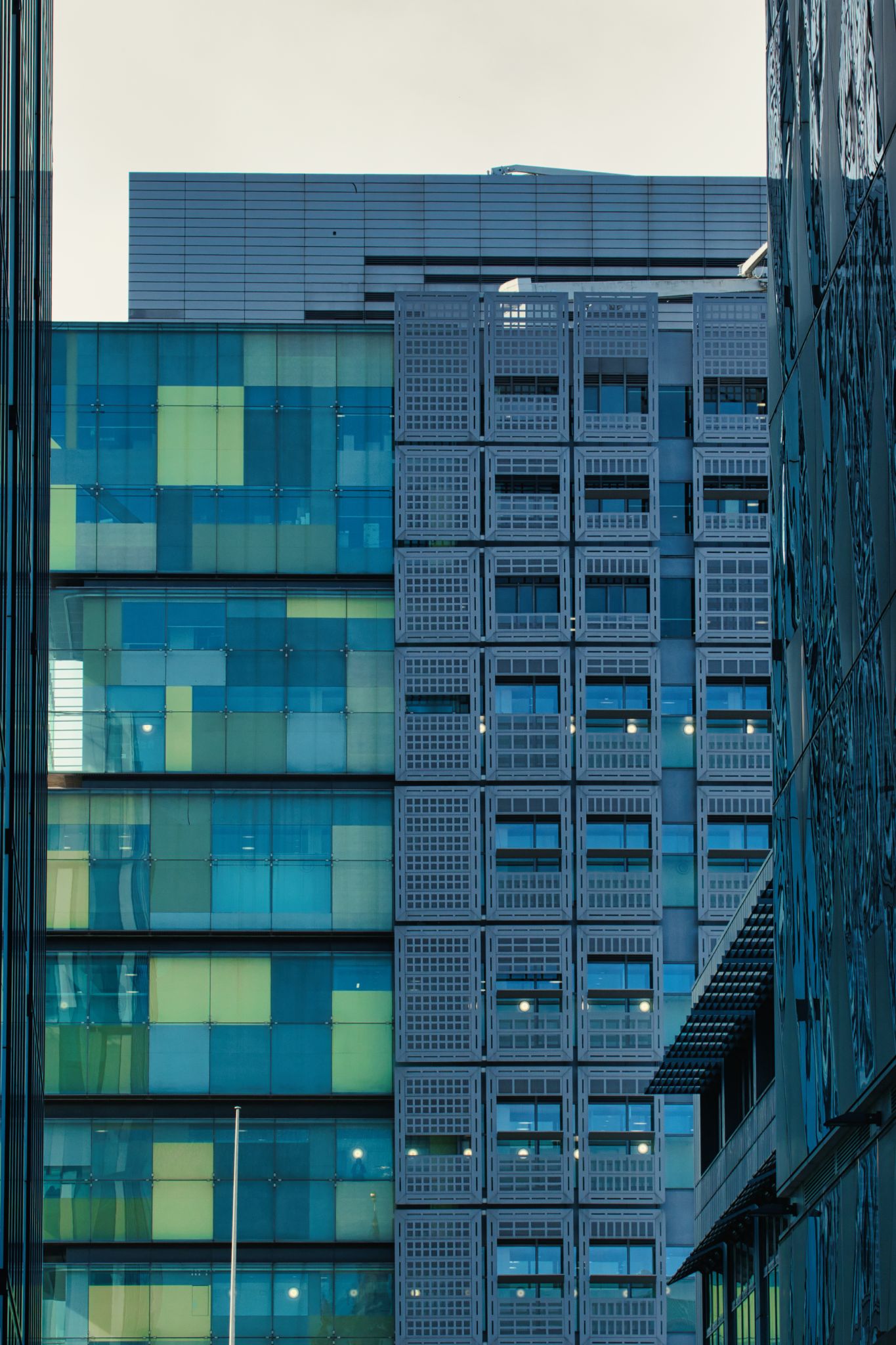 Exterior View of Modern Buildings with Distinct Facades in Manchester, UK.