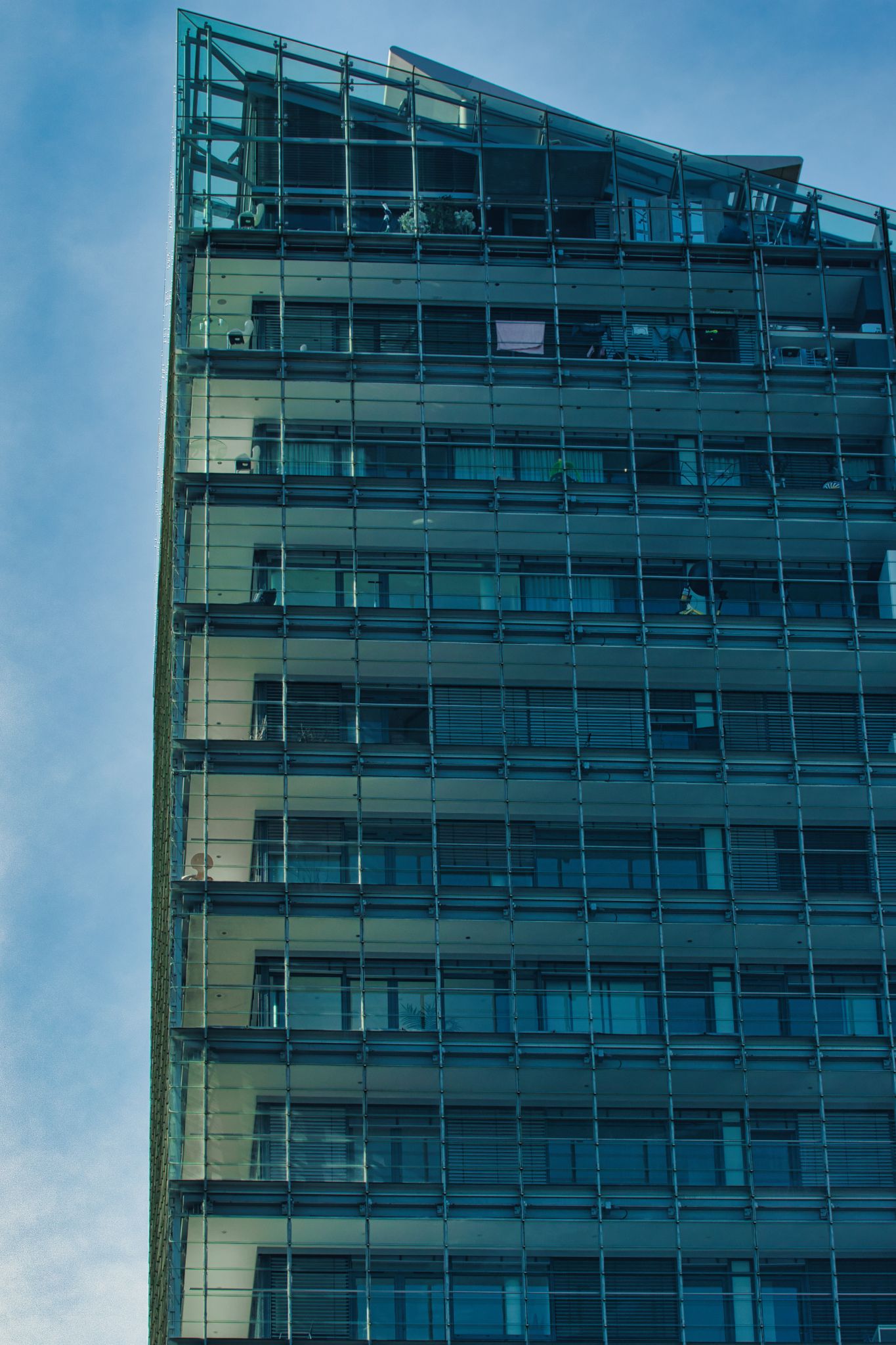 Exterior View of Modern Glass Building in Manchester, UK.