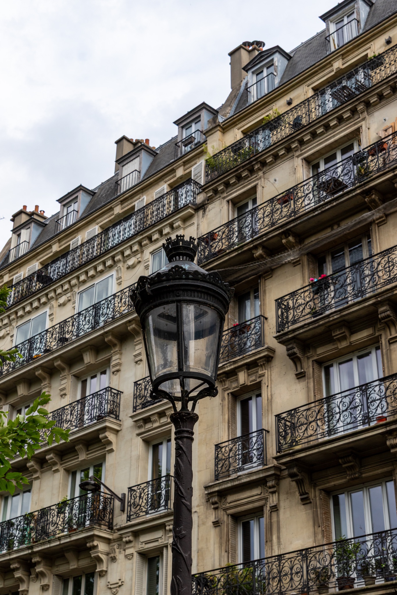 Apartment Building with Balconies and Street Lamp, Paris